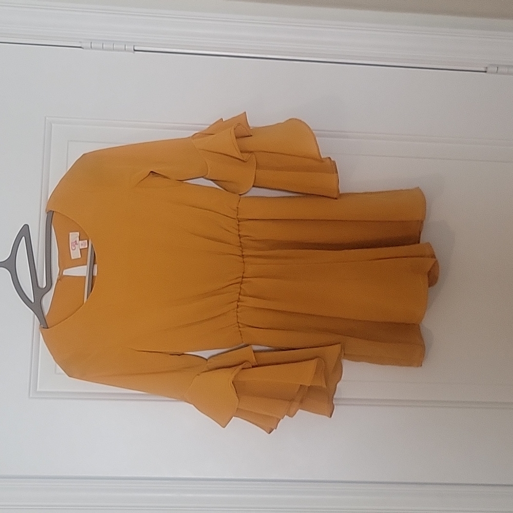 GB girls mustard short jumpsuit, worn only once. Great condition. Size med girls